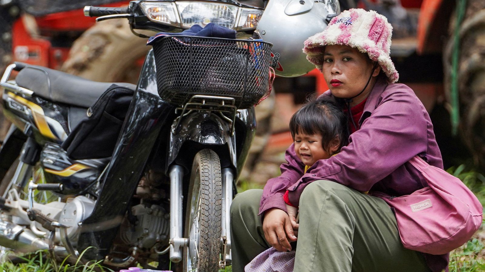 Disputed Area Of Ta Moan Thom Temple In Cambodia A Woman And Her Kid Awaiting Evacuation Photocredit Reuters