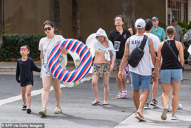 Hawaii Residents Evacuating Their Various Homes For Safety Ahead Of Tsunami Forecast