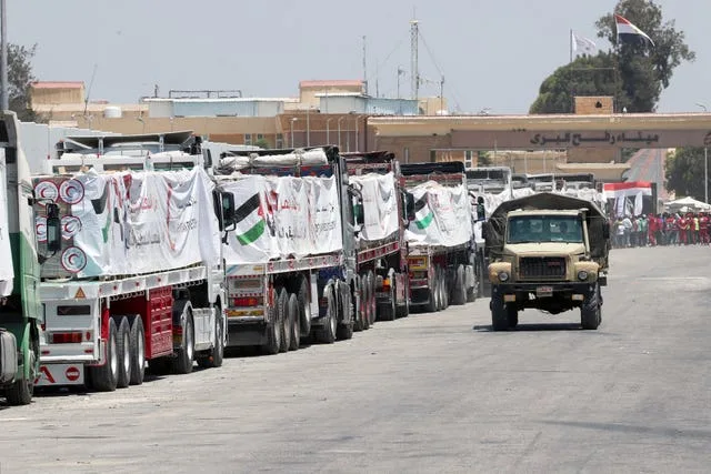 A Line Up Of Humanitarian Trucks Awiating To Cross Border Between Egypt And Gaza