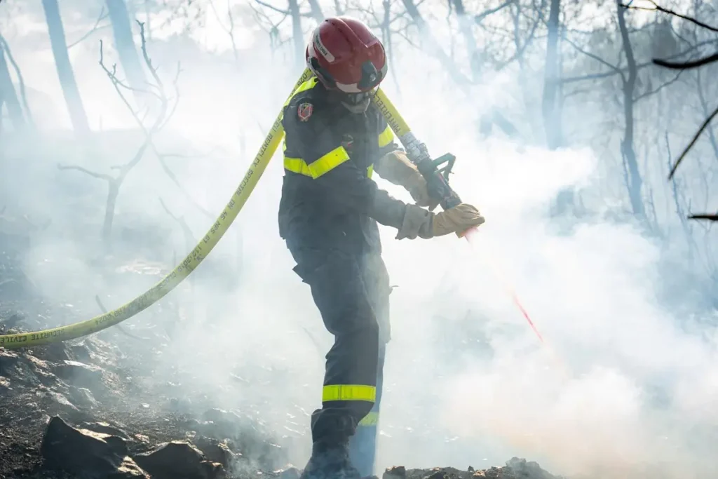 Fire Emergency Responder On Active Service Combating The Fire