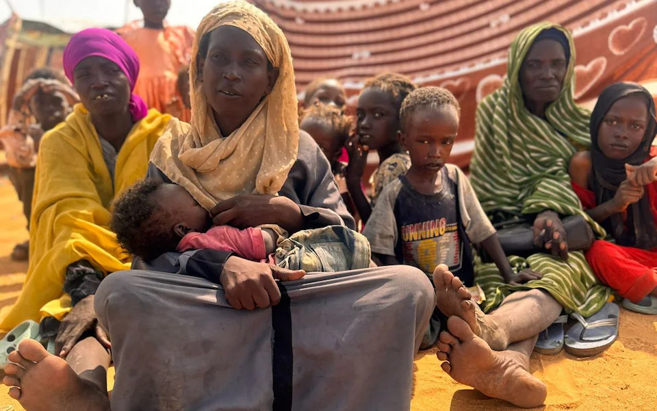Mother Nursing Her Sick Children Inflicted With The Disease