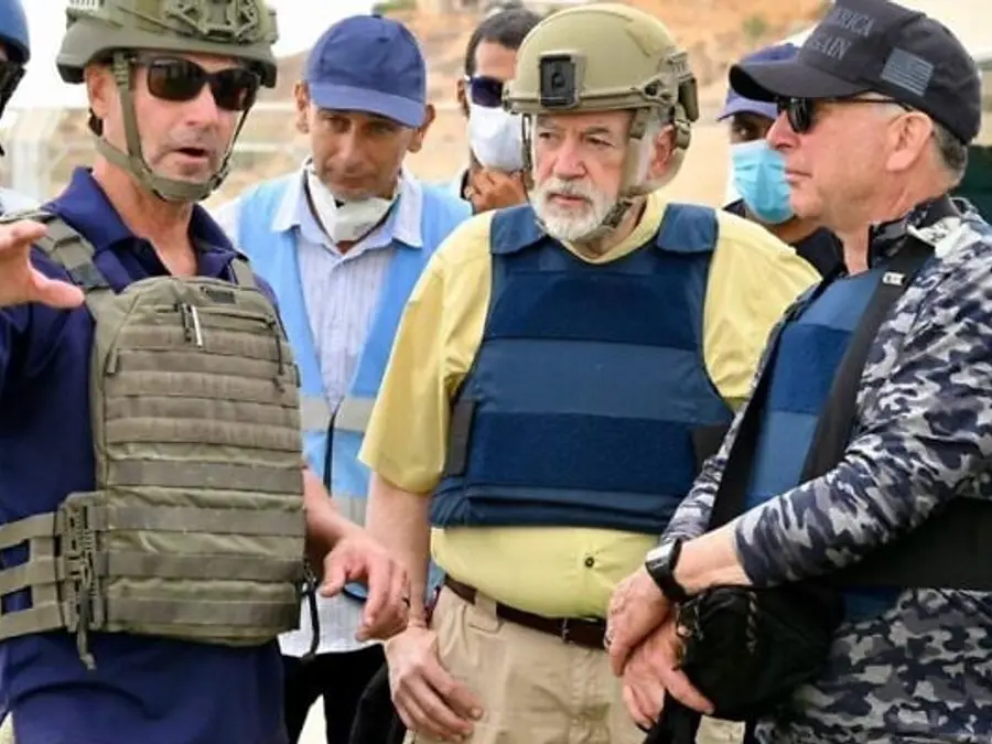 Palestinian Soldier With The Visiting Envoy To Gaza