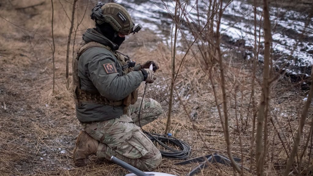 A Serviceman Preparing A Starlink Satellite In Unkraine