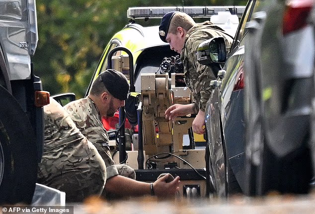 British Army Bomb Squad Were Seen On The Scene With Their Robots