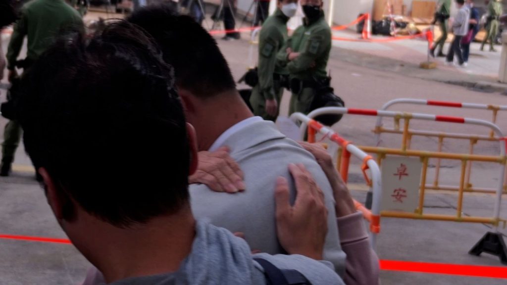 The Community Is Coming Together In Their Grief Hugging And Supporting Each Other