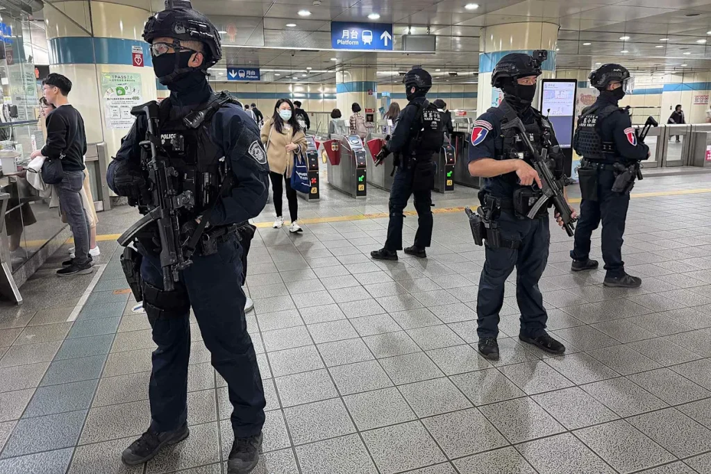 Taiwan Police Officers Positioned Battle Ready At A Station In Taiwan City